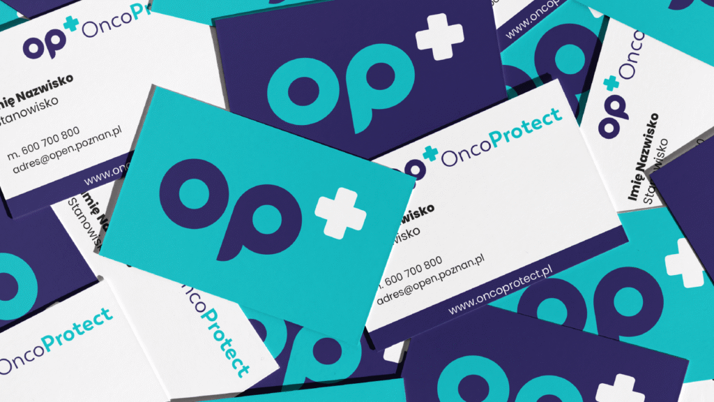 Wizytówki programu Onco Protect z nowoczesnym logotypem i brandingiem w kolorystyce medycznej.